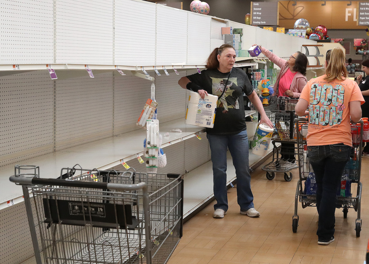 Shelves normally stocked with toilet paper and paper towels sit empty at a Giant Supermarket store as people stockpile supplies due to the outbreak of the coronavirus (COVID-19) March 13, 2020 in Dunkirk, Maryland. The U.S. government is racing to make more coronavirus test kits available as schools close around the country, sporting events are canceled, and businesses encourage workers to telecommute where possible. 