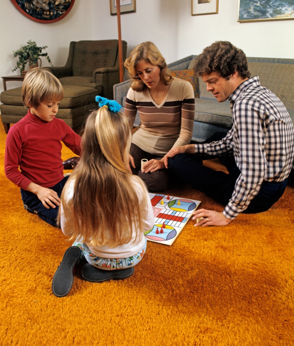 Family Playing Games on Shag Carpeting 1970s Home Decor