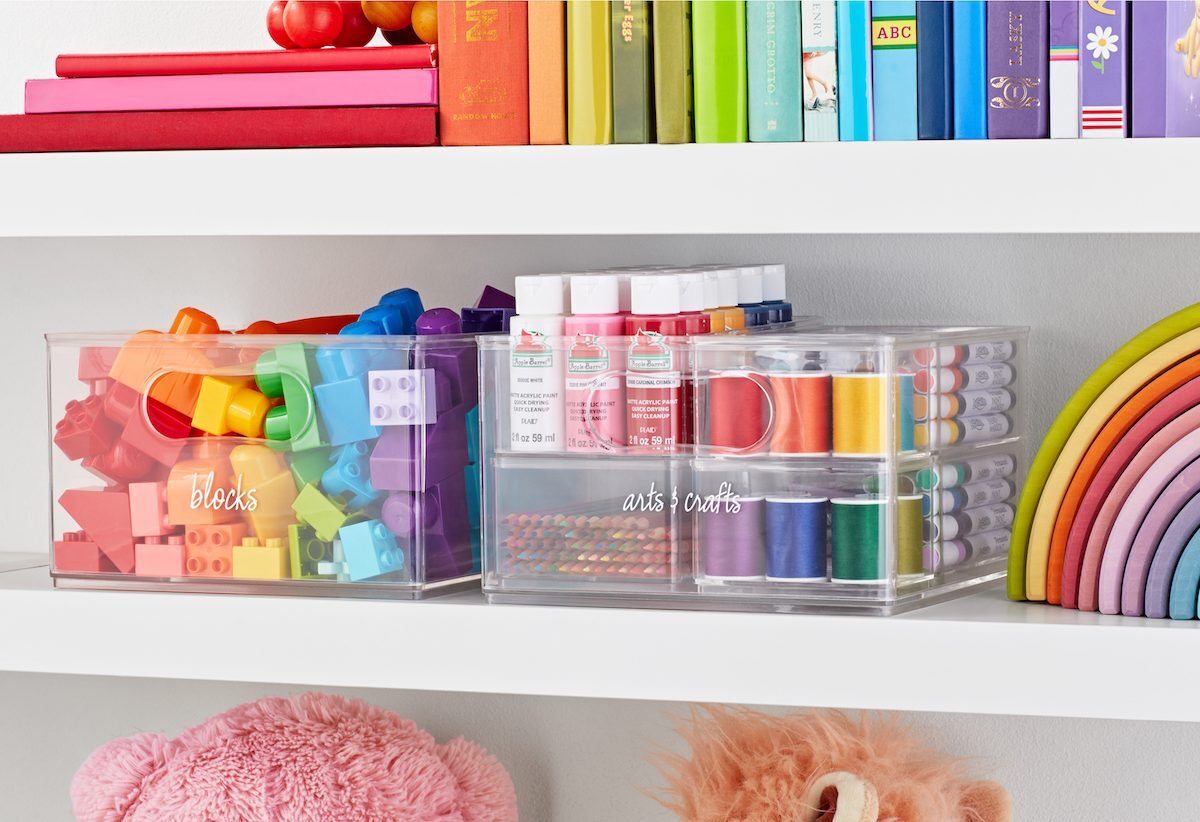 A colorful, organized shelf displaying The Home Edit storage system at Walmart.