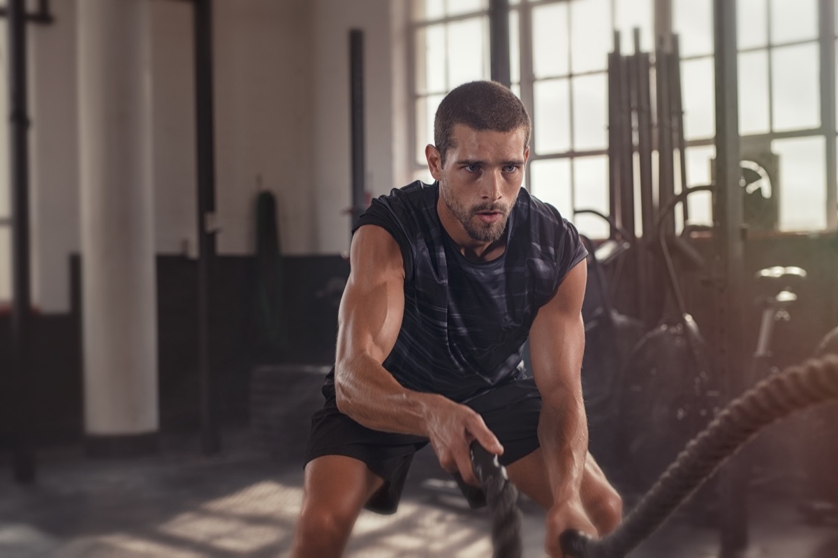 Man doing rope exercise