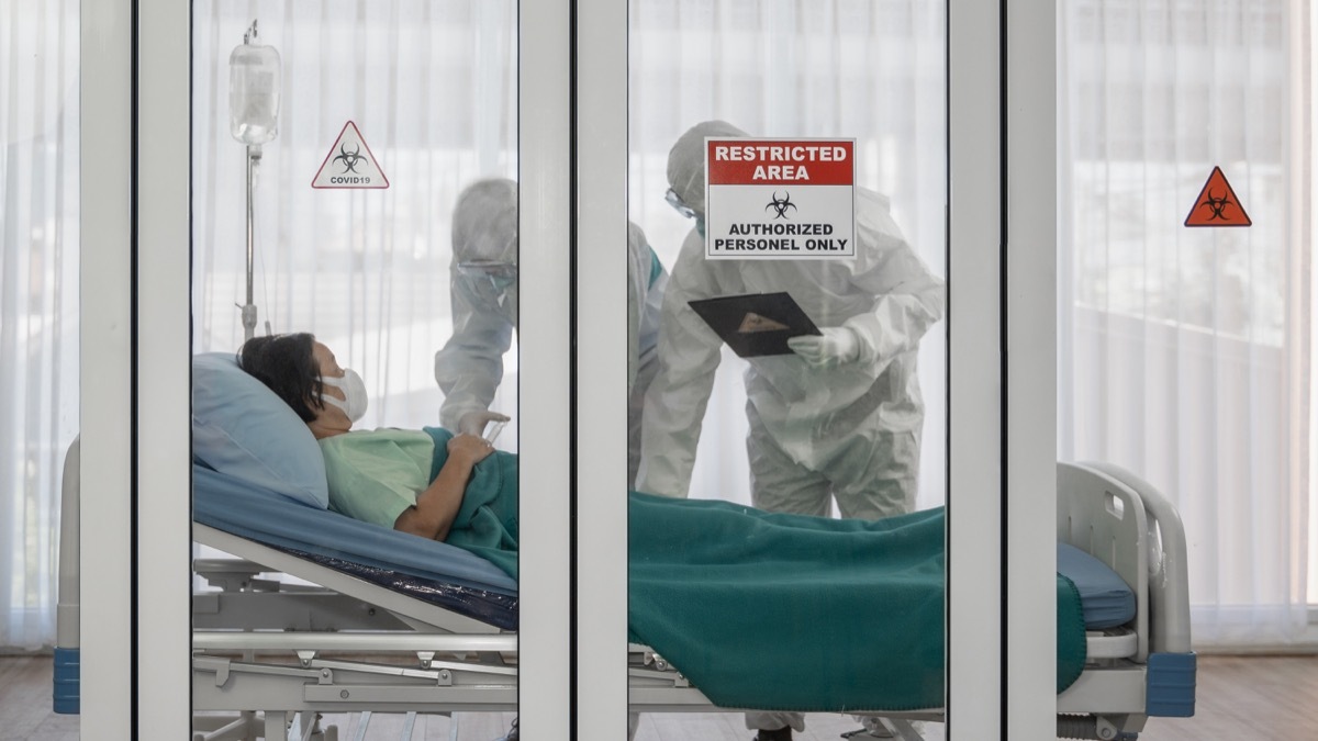 Woman in a hospital bed during coronavirus