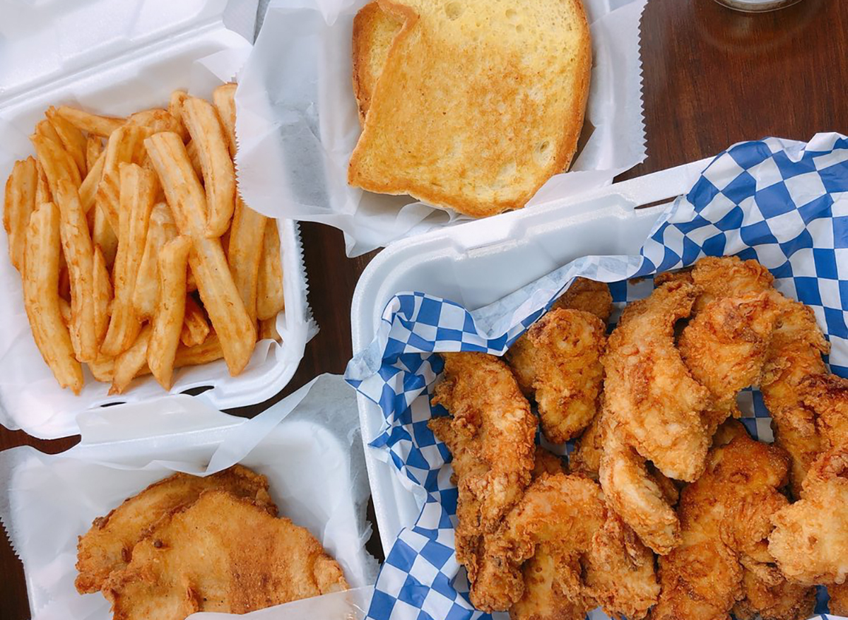 plates of chicken and fries