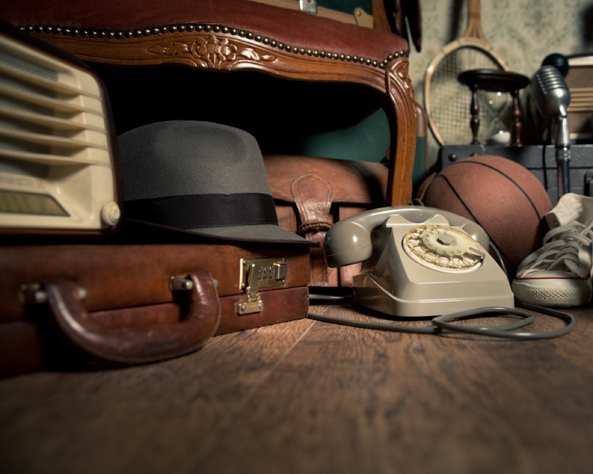 clothing and suitcases and telephones and a basketball in a basement, things you should never store in your basement