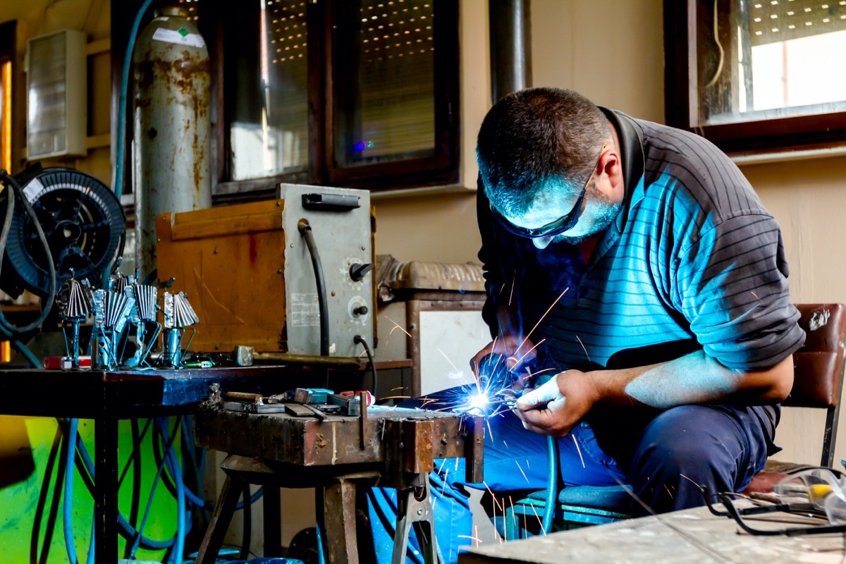 Man welding in his shop Emmys Facts