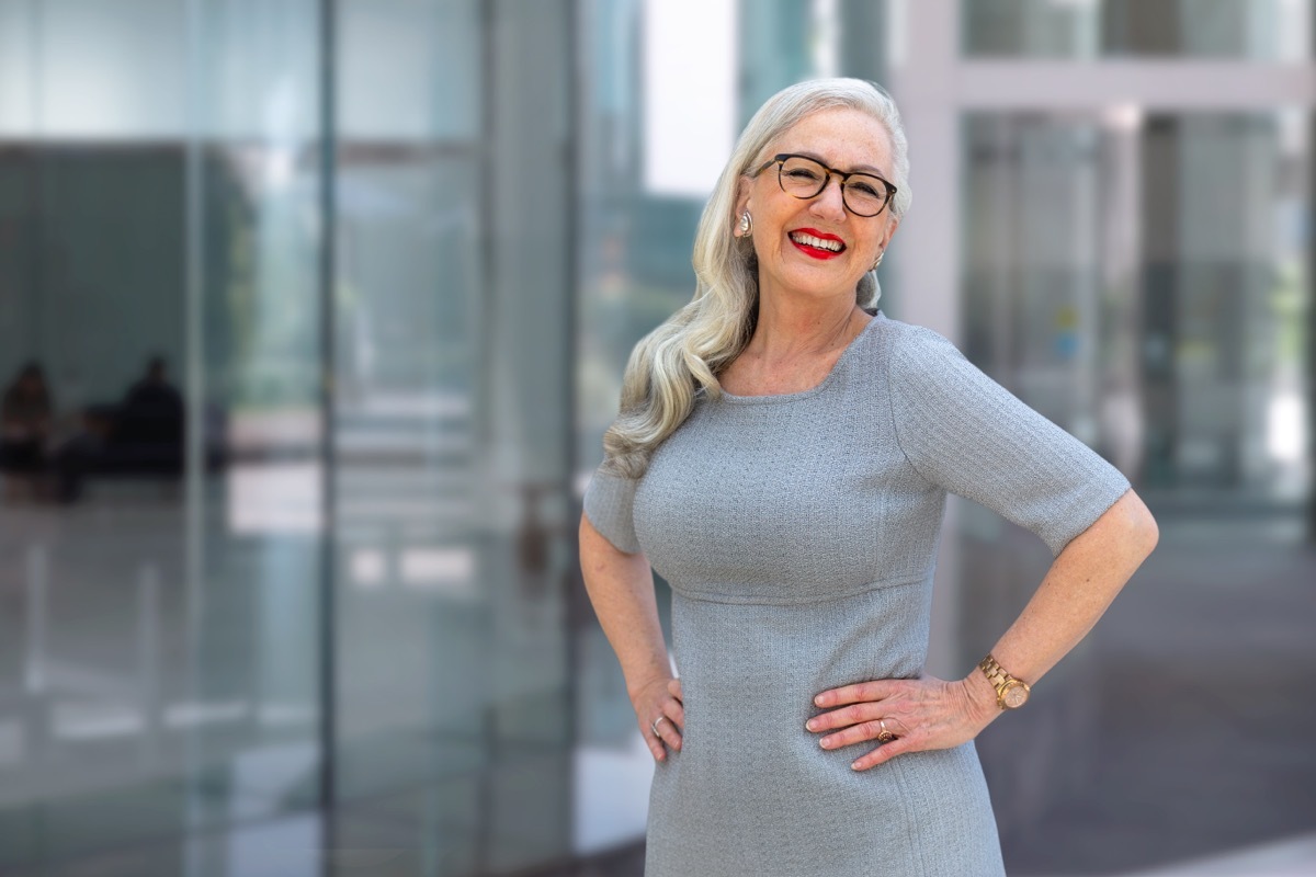 Confident Senior Woman Posing Outside