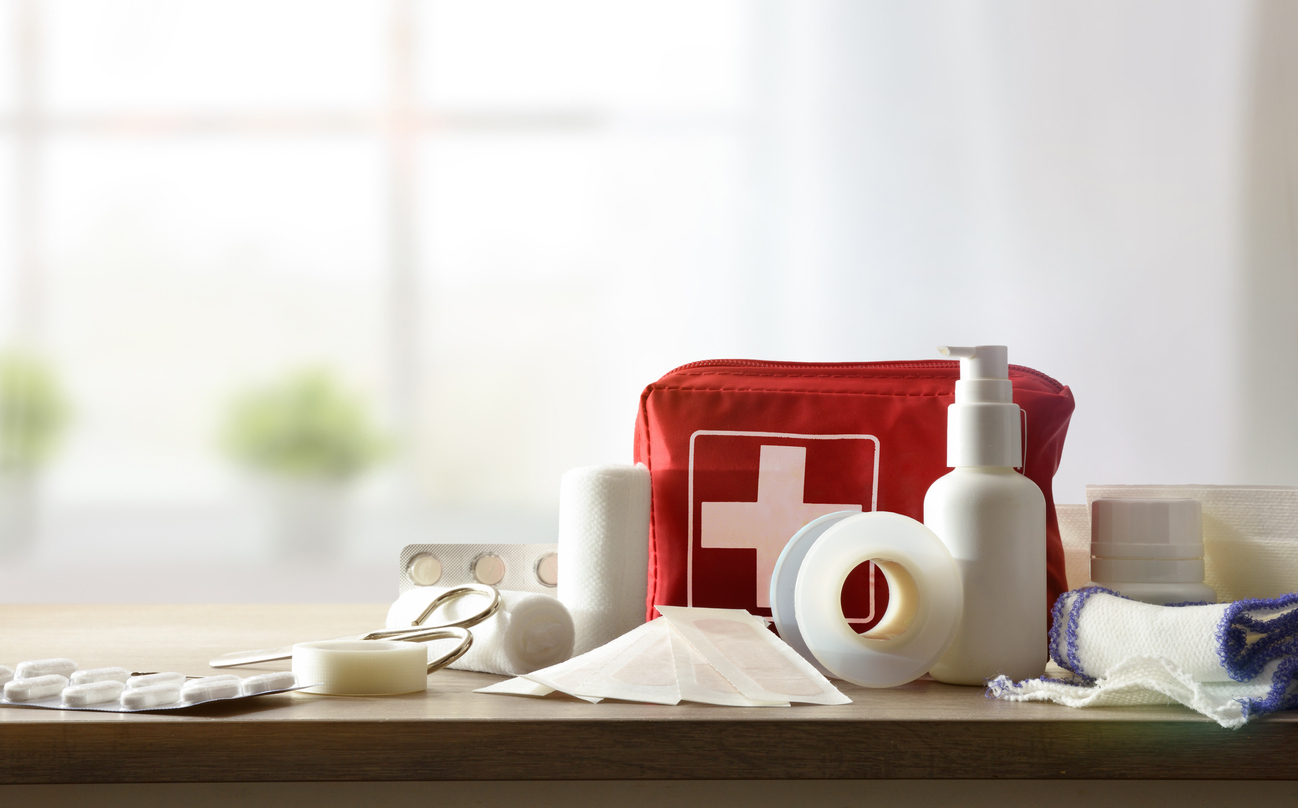 Basic home first-aid kit on a table.