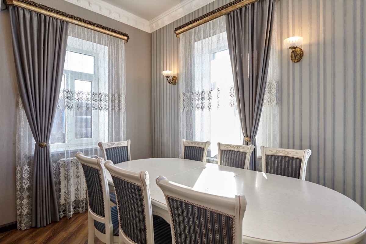 dining room with striped chairs