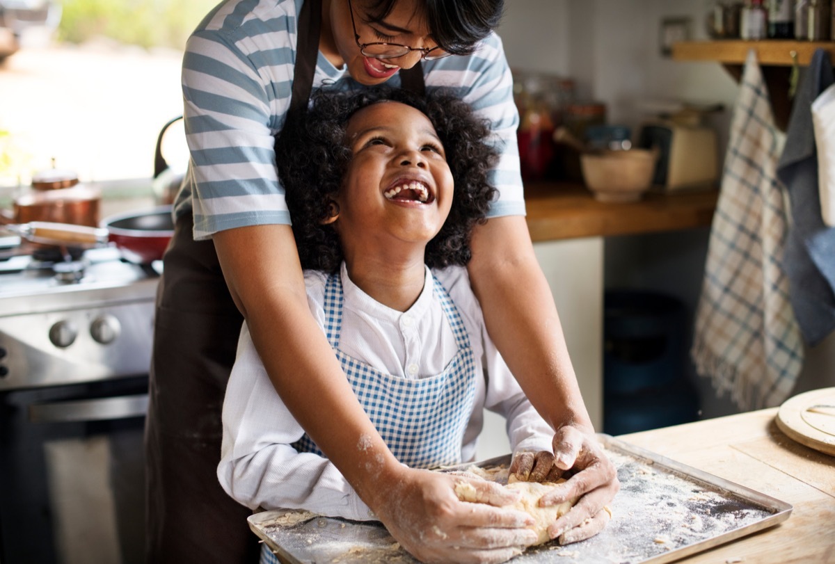 Mother and child baking