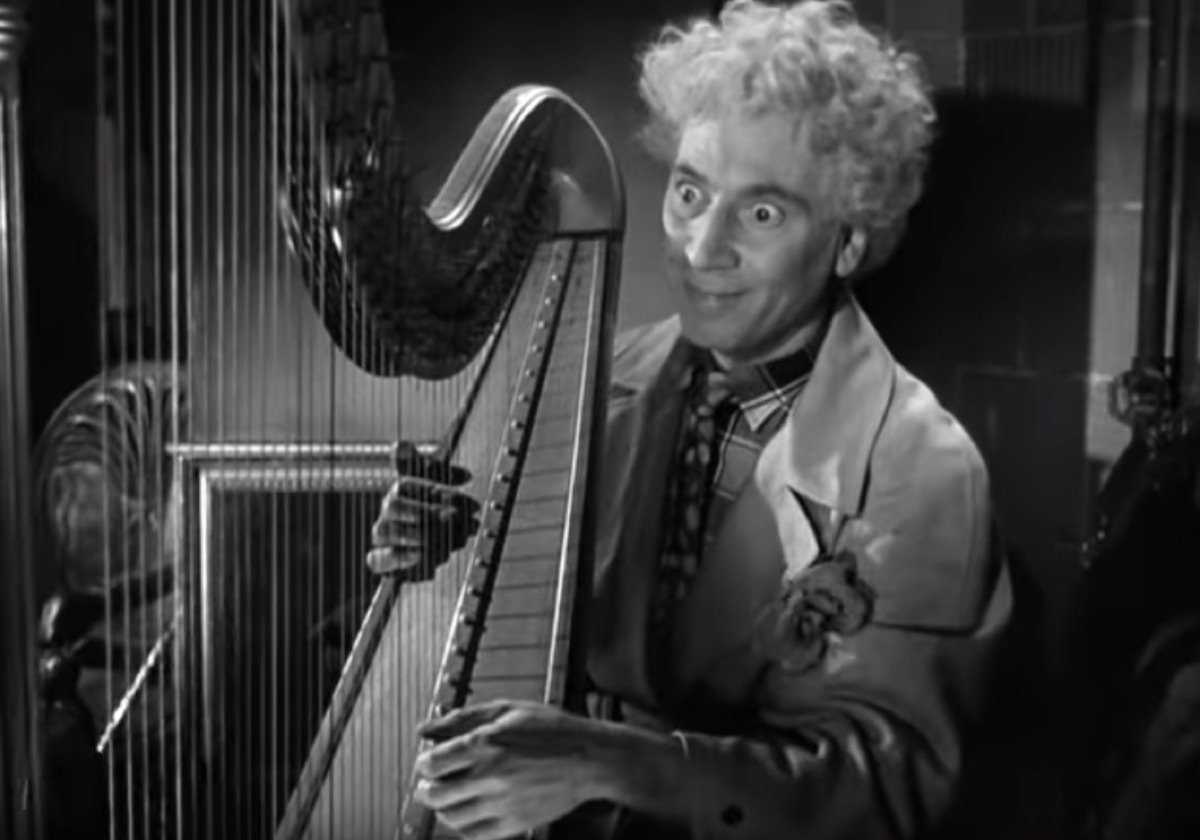 Harpo Marx playing the harp