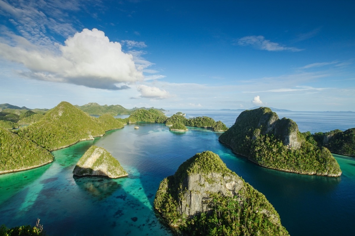 a collection of thousands of islands in raja ampat Indonesia