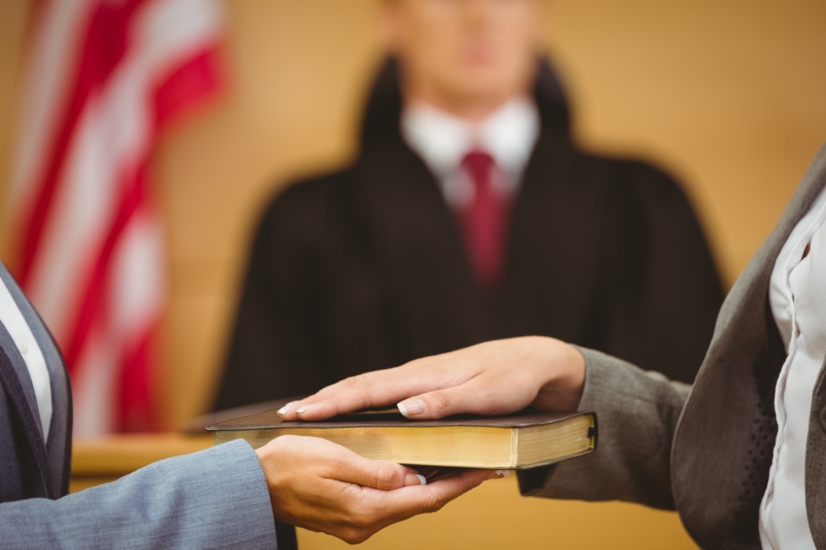 women getting sworn in with bible, achievements women