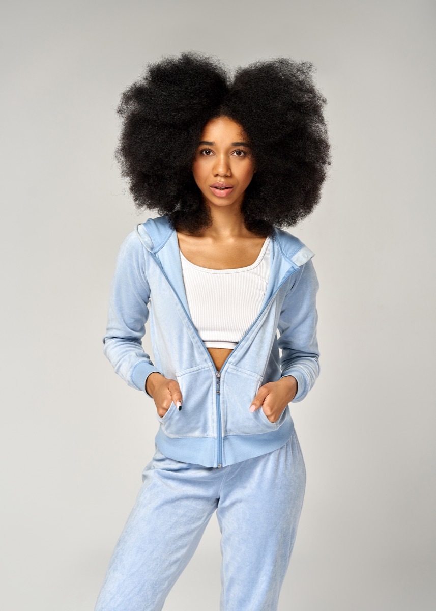 girl wearing blue velour tracksuit