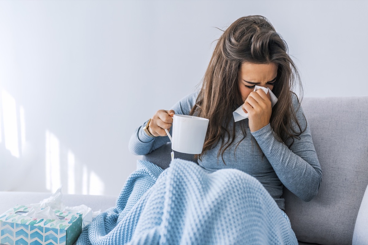 woman home sick with covid