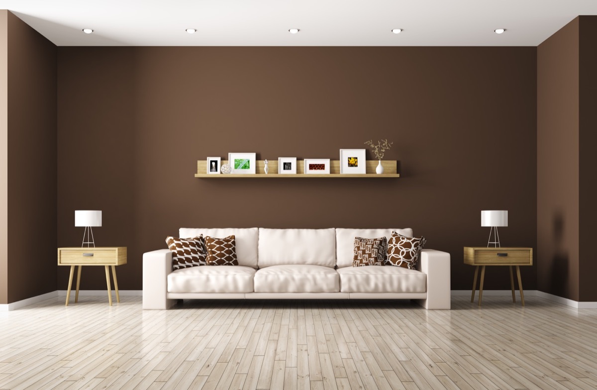 living room with brown walls