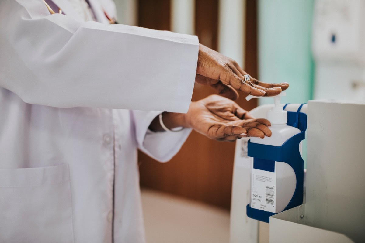 Female Doctor Using Hand Sanitizer in the Hospital Hand Sanitizer Germs