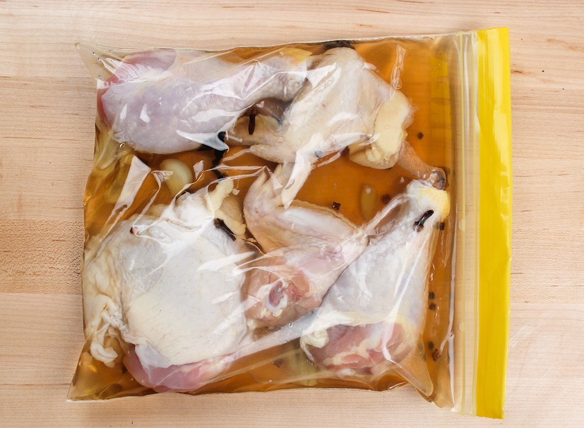 chicken sitting in a wet brine