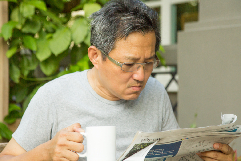 Upset Man Reading News Sensitive