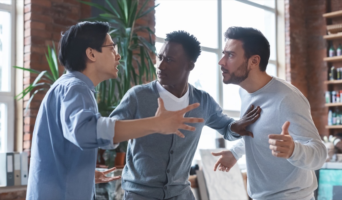 coworkers having quarrel in office, conflict of interest