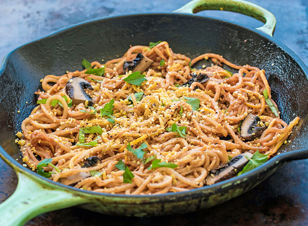 spiralized kohlrabi and summer squash spaghetti in a large skillet