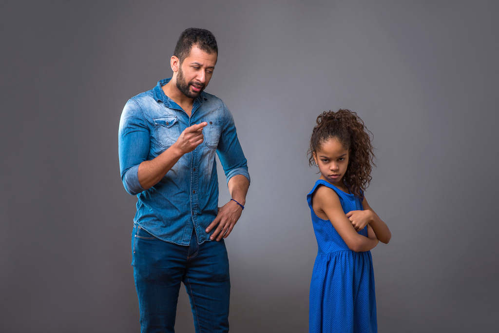 father arguing with daughter