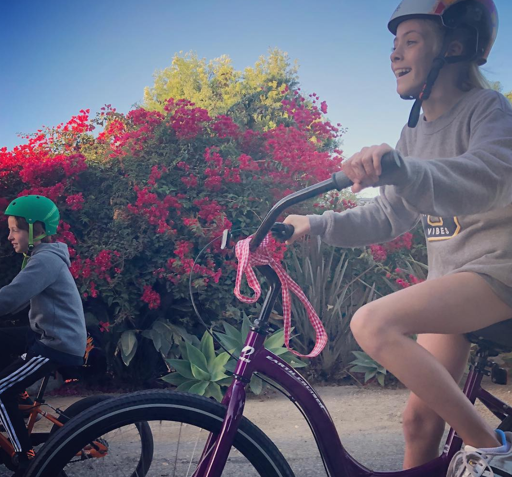 Phinnaeus and Hazel Moder riding bikes