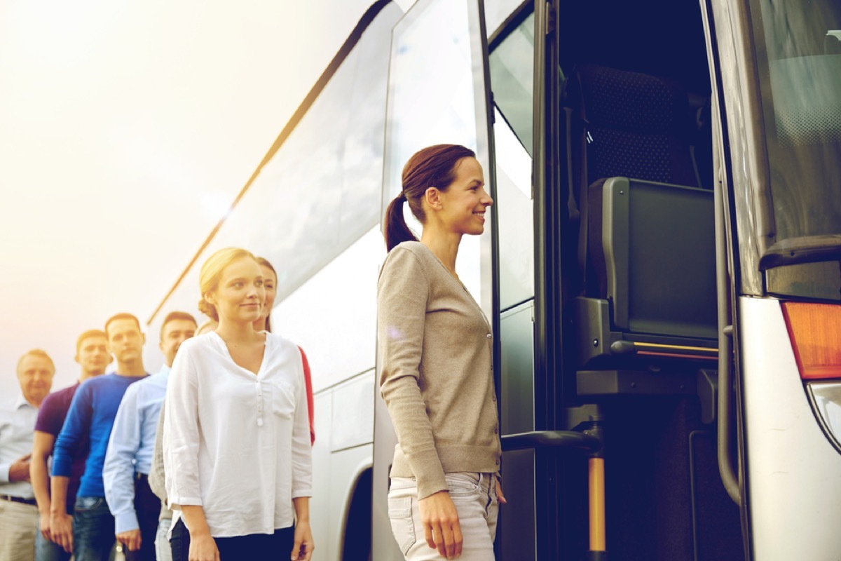 woman boarding bus, worst things about the suburbs