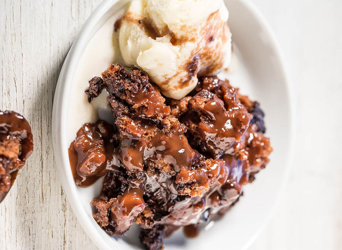 slow cooker lava cake on plate with ice cream