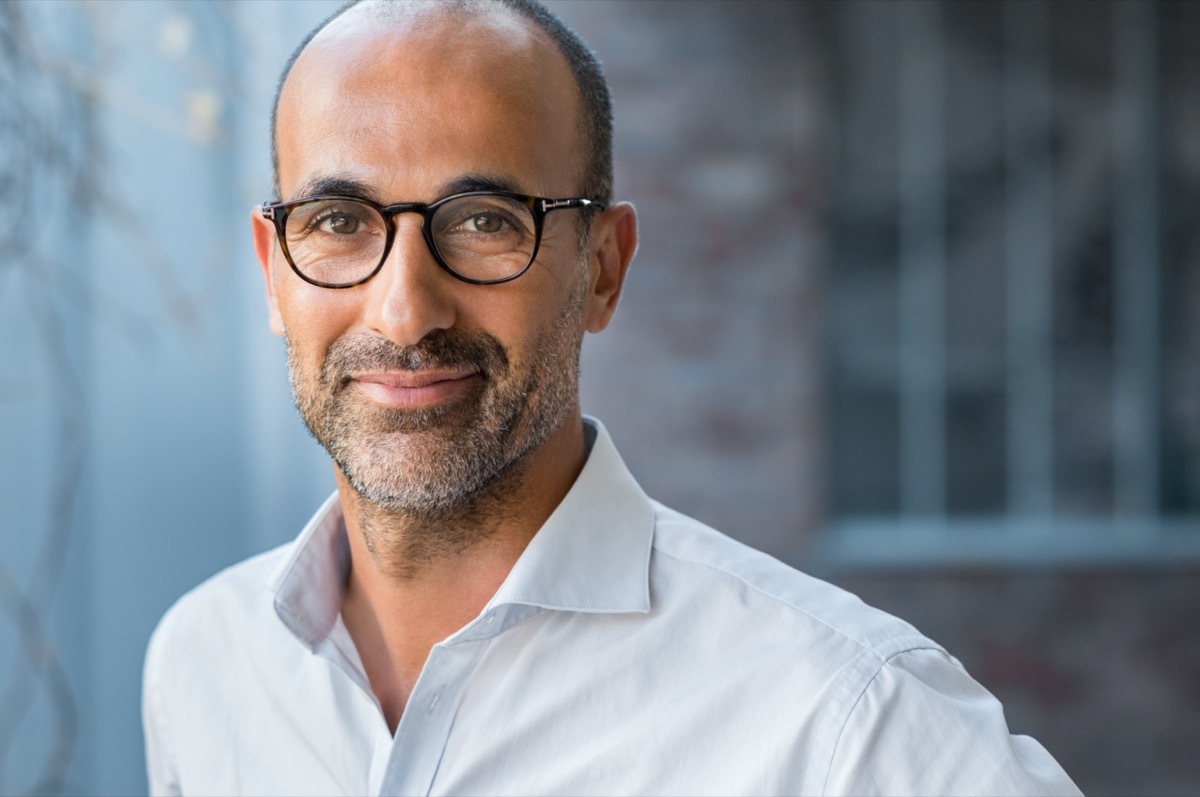 happy middle age man with glasses