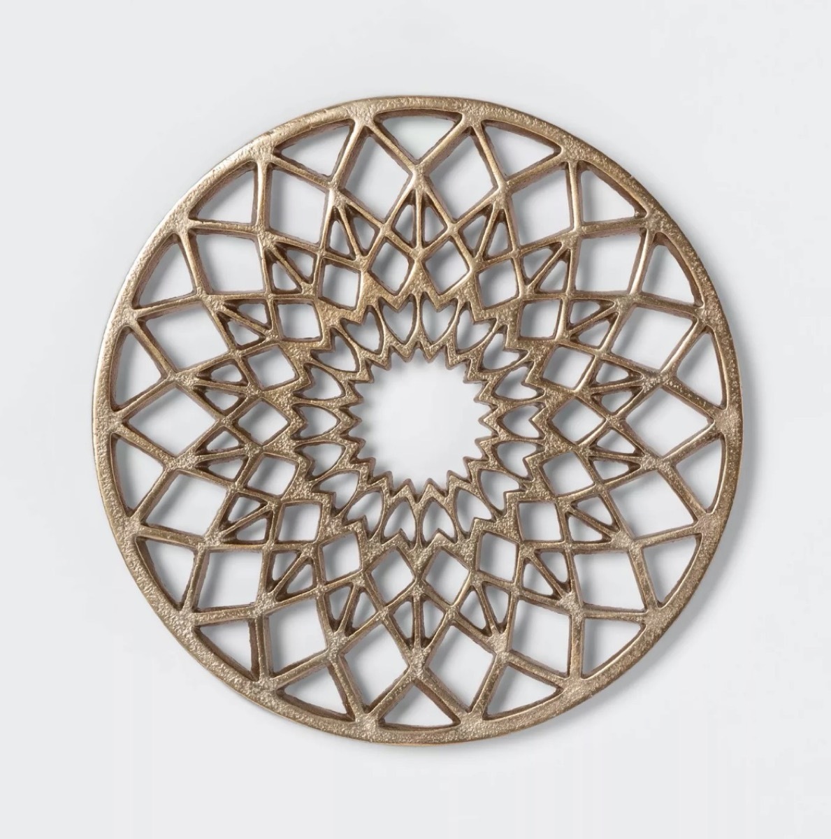 gold toned trivet