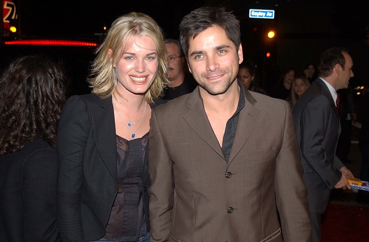 Rebecca Romijn and John Stamos in 2001