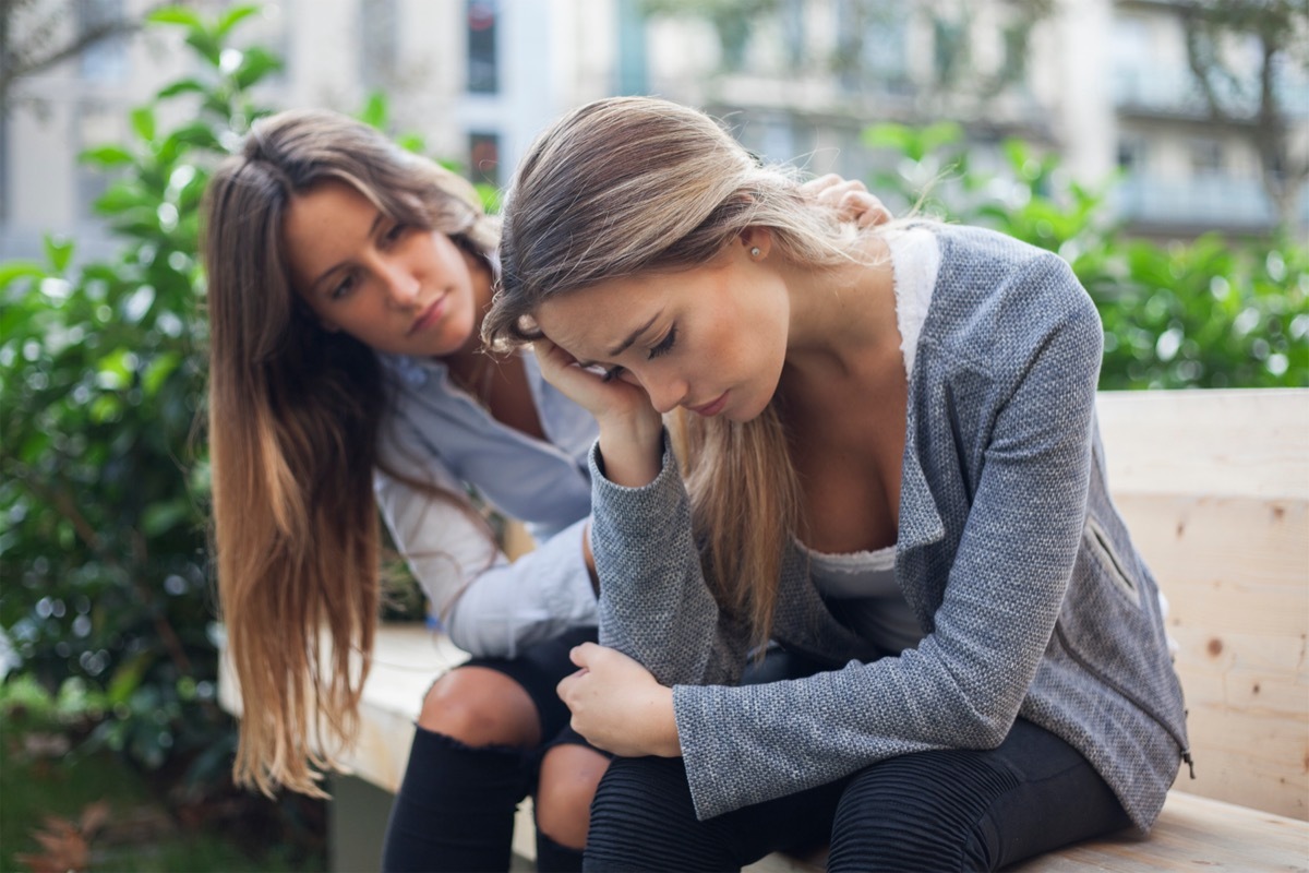 One Woman Comforting the Other