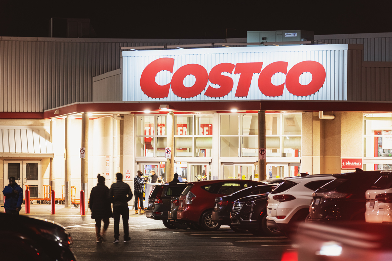 A Costco warehouse entrance at night