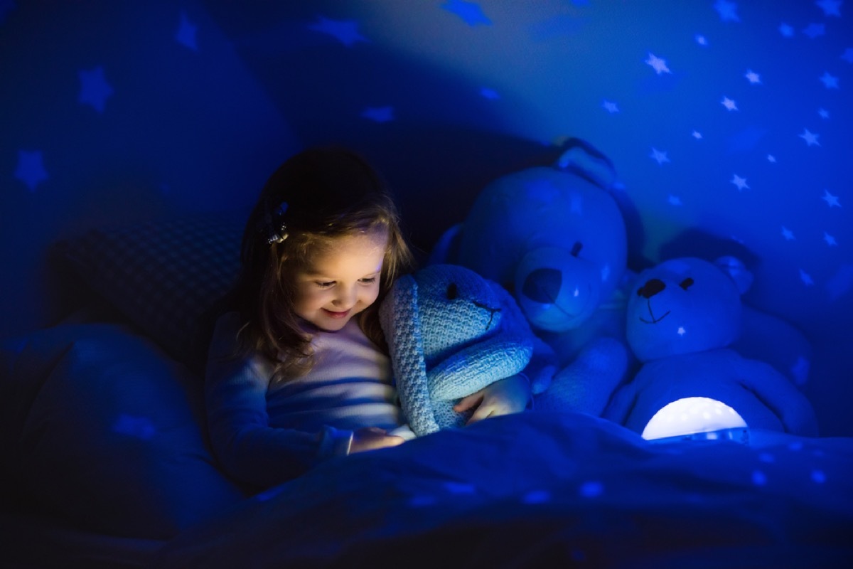 little girl reading in bed, ways to feel amazing